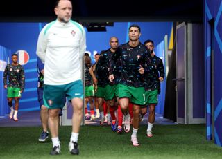 Cristiano Ronaldo of Portugal prepares to leave the tunnel for the warmup prior to the UEFA EURO 2024 quarter-final match between Portugal and France at Volksparkstadion on July 05, 2024 in Hamburg, Germany. 