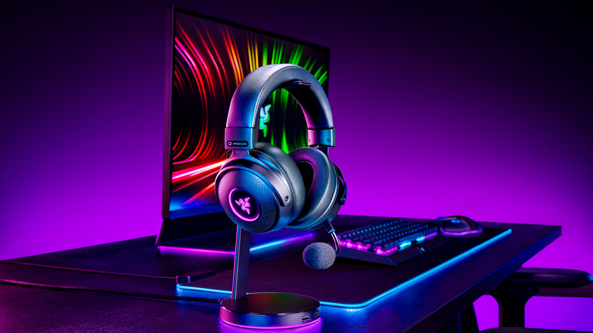 Razer Kraken V3 shown on a stand on a desk