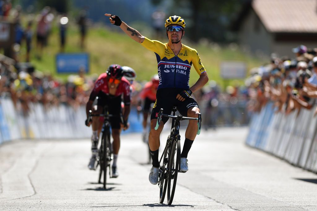SAINTVULBAS FRANCE AUGUST 08 Arrival Primoz Roglic of Slovenia and Team Jumbo Visma Celebration Egan Arley Bernal Gomez of Colombia and Team INEOS Valerio Conti of Italy and UAE Team Emirates during the 32nd Tour de LAin 2020 Stage 2 a 141km stage from Lagnieu to Llex MontsJura 896m tourdelain TOURDELAIN TDA on August 08 2020 in SaintVulbas France Photo by Justin SetterfieldGetty Images