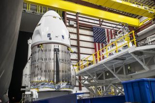 SpaceX’s Crew Dragon capsule for the Crew-3 mission to the International Space Station arrives at the hangar at Kennedy Space Center’s Launch Complex 39A in Florida on Oct. 24, 2021. 