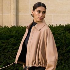 Woman wearing tan 24S jacket