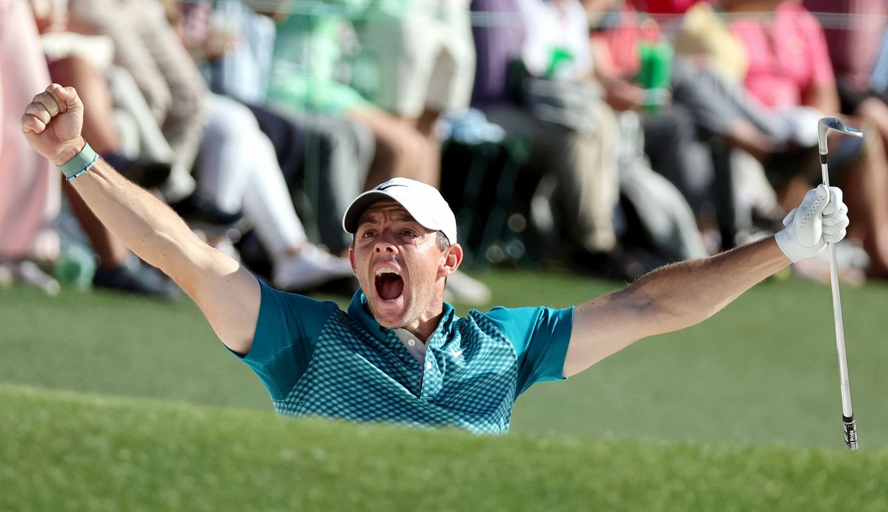 McIlroy fist pumps