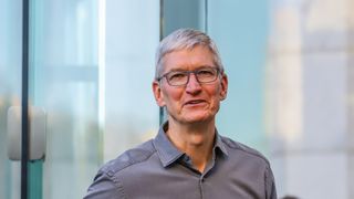 Apple CEO, Tim Cook openS the door of the newly renovated Apple Store at Fifth Avenue on September 20, 2019 in New York City.