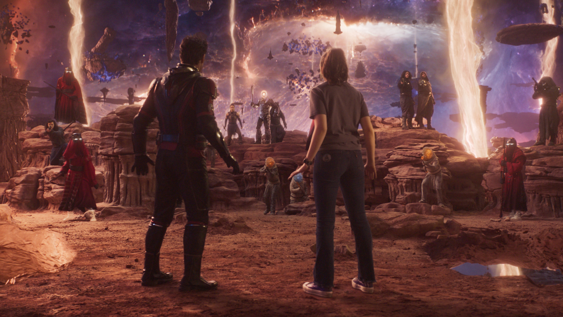 Scott and Cassie Lang are approached by some Quantum Realm armed personnel in Ant-Man and the Wasp: Quantumania