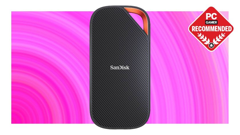 A SanDisk Extreme Pro external SSD on a pink background with the PC Gamer Recommended label on top.