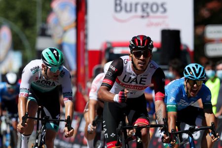 ARANDA DE DUERO SPAIN AUGUST 06 Juan Sebastin Molano Benavides of Colombia and UAE Team Emirates celebrates at finish line as stage winner during the 43rd Vuelta a Burgos 2021 Stage 4 a 149km stage from Roa to Aranda de Duero VueltaBurgos BurgosCycling CapitalMundialdelCiclismo on August 06 2021 in Aranda de Duero Spain Photo by Gonzalo Arroyo MorenoGetty Images