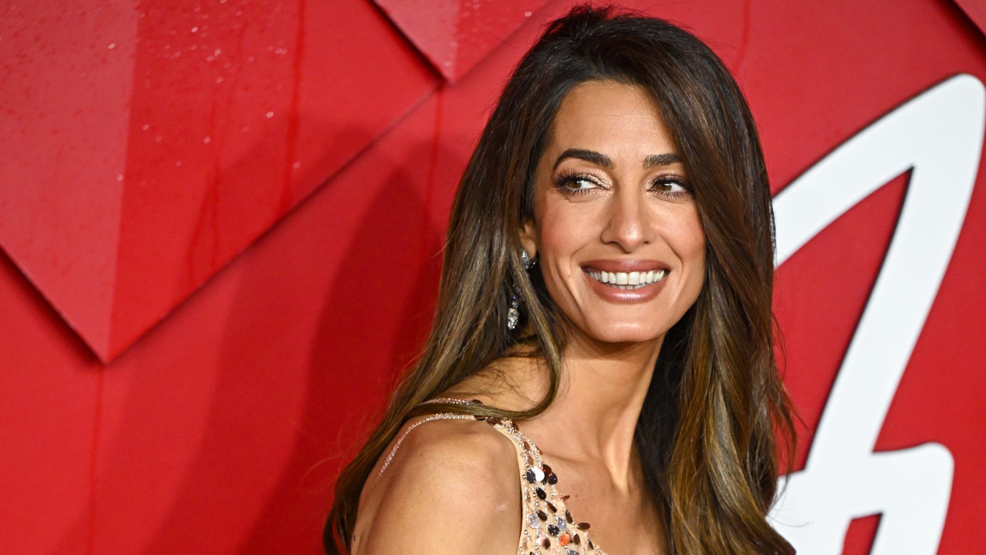 a headshot of amal clooney 