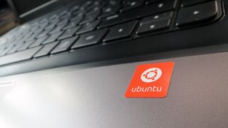 Ubuntu logo next to a computer keyboard