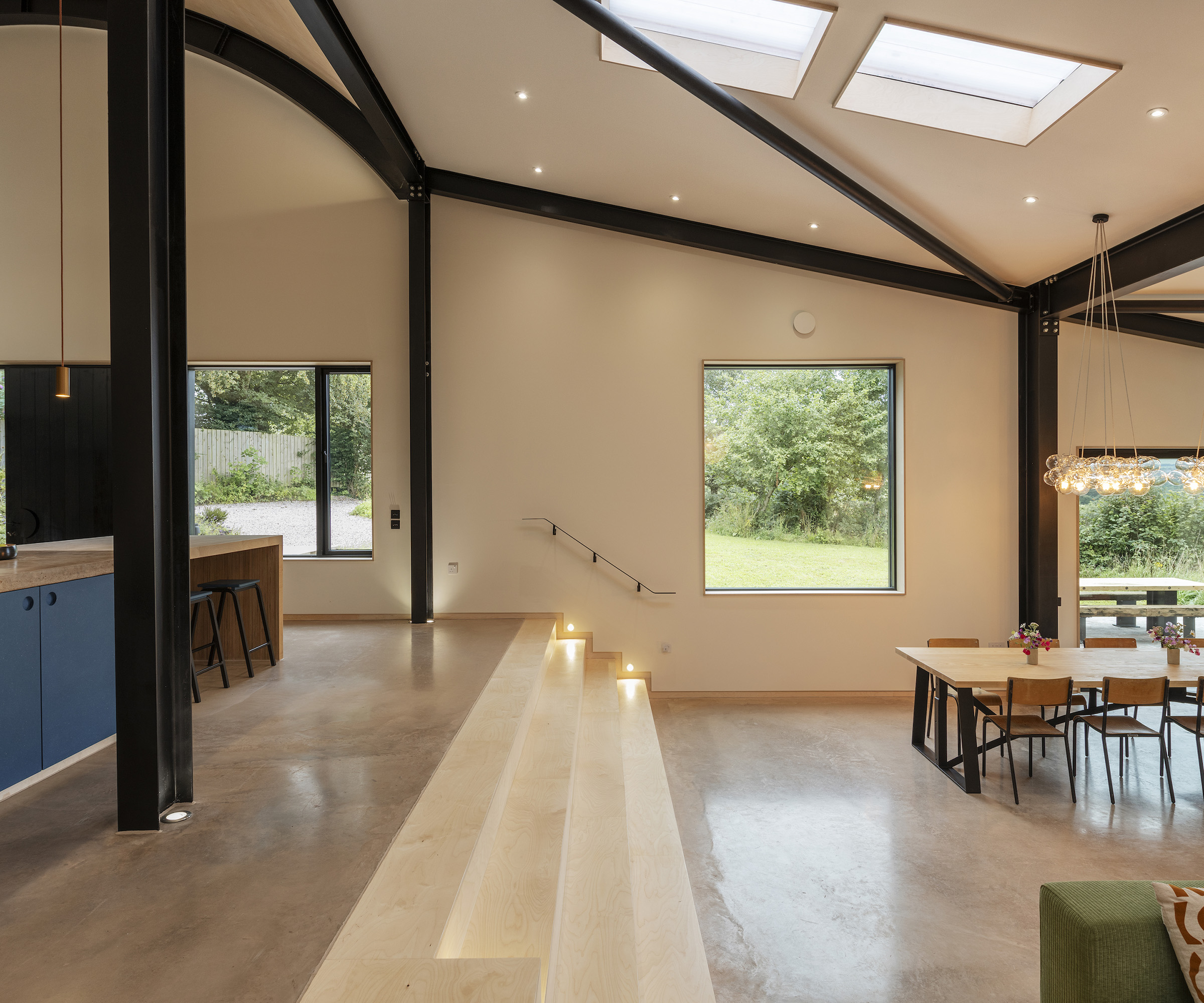 split level open plan living space in a converted barn