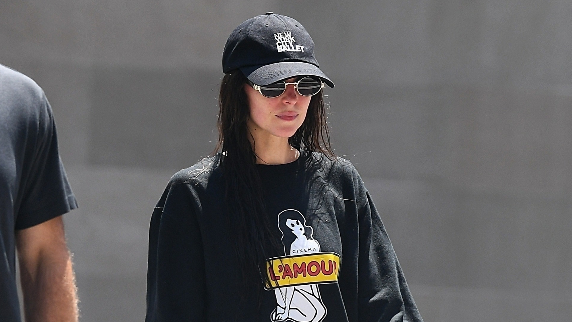 Dakota Johnson swaps her usual flat sneakers for a chunkier Nike pair.
