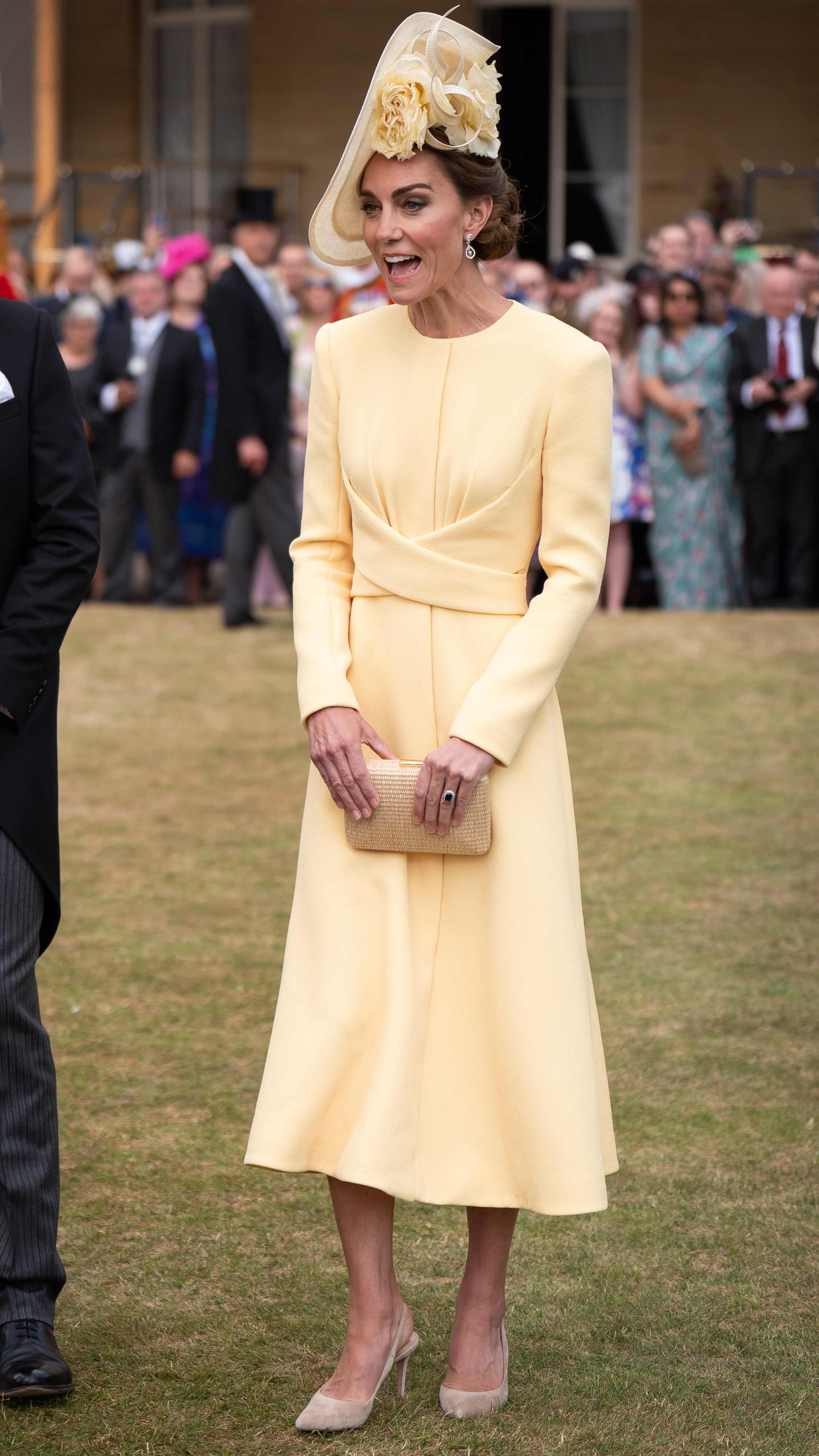 Catherine, Princess of Wales greets guests during a Royal Garden Party at Buckingham Palace on May 20, 2025