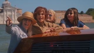 Dian Keaton pointing, Jane Fonda, Candice Bergan and Mary Steenburgen on a boat.