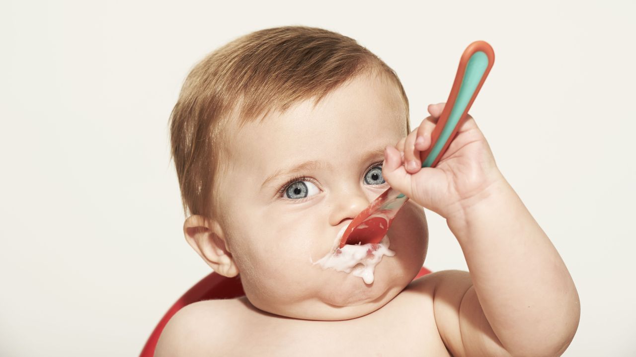 Finger, Child, Neck, Taste, Kitchen utensil, Toddler, Eyelash, Spoon, Nail, Baby, 