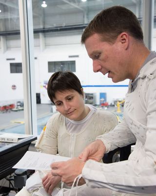 Astronauts Prep for Spacewalk Testing in Neutral Buoyancy Lab