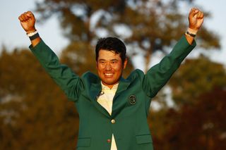 Matsuyama celebrates after receiving the Green Jacket