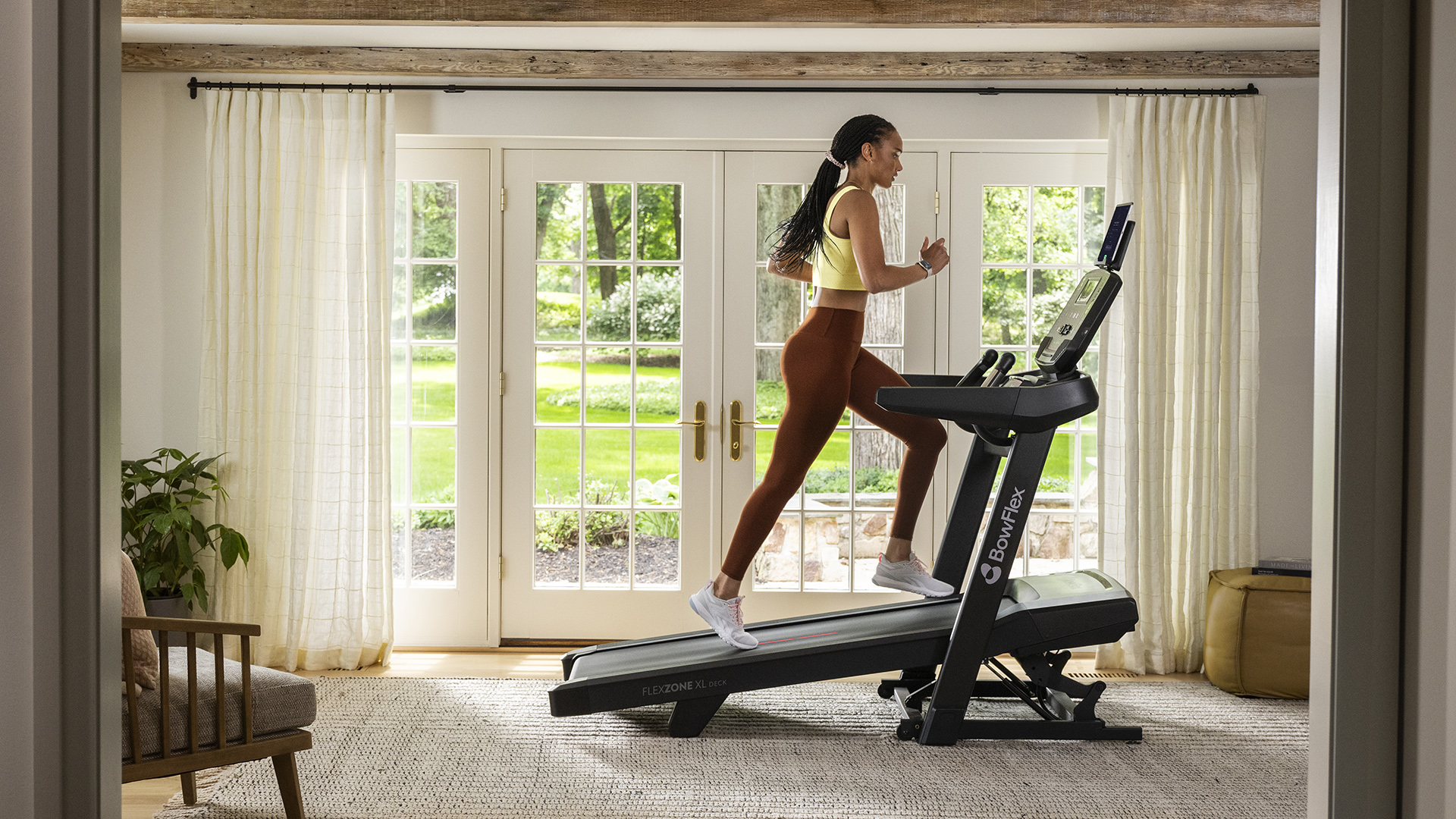 Bowflex T9 treadmill used in living room 