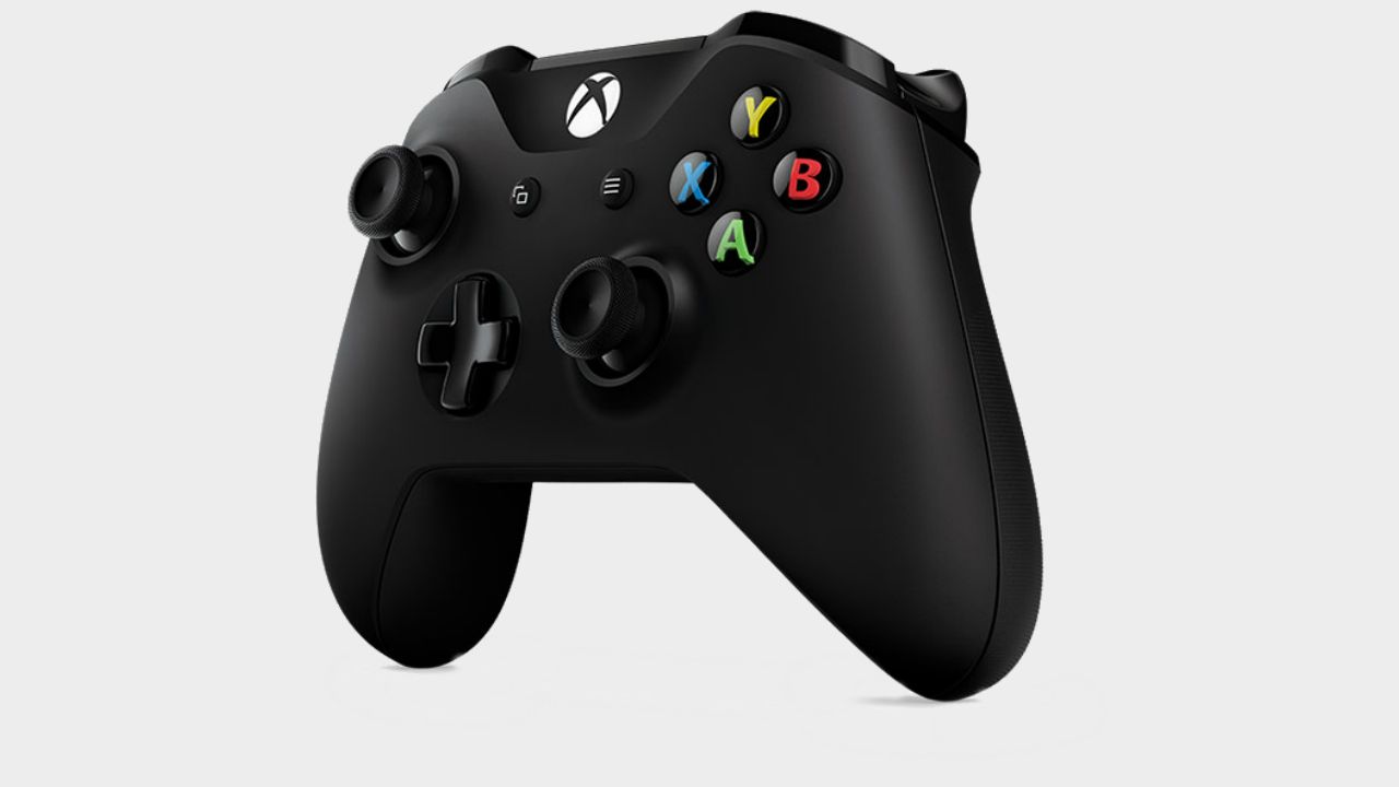 A carbon Black Xbox One controller on a plain background
