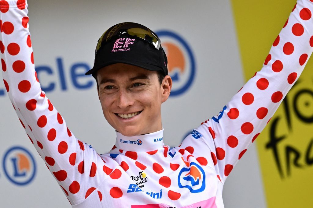 EF Education Easyposts US rider Neilson Powless celebrates on the podium with the best climbers dotted jersey after the 8th stage of the 110th edition of the Tour de France cycling race 201 km between Libourne and Limoges in central western France on July 8 2023 Photo by Marco BERTORELLO AFP Photo by MARCO BERTORELLOAFP via Getty Images