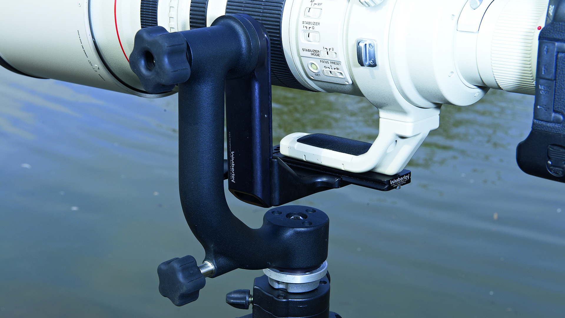 Closeup of Wimberley WH-200 II gimbal head with Canon camera and lens attached