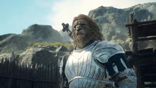 A lion-man clad in plate armor looks stoic