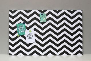 noticeboard with white and black chevron style print by not on the highstreet