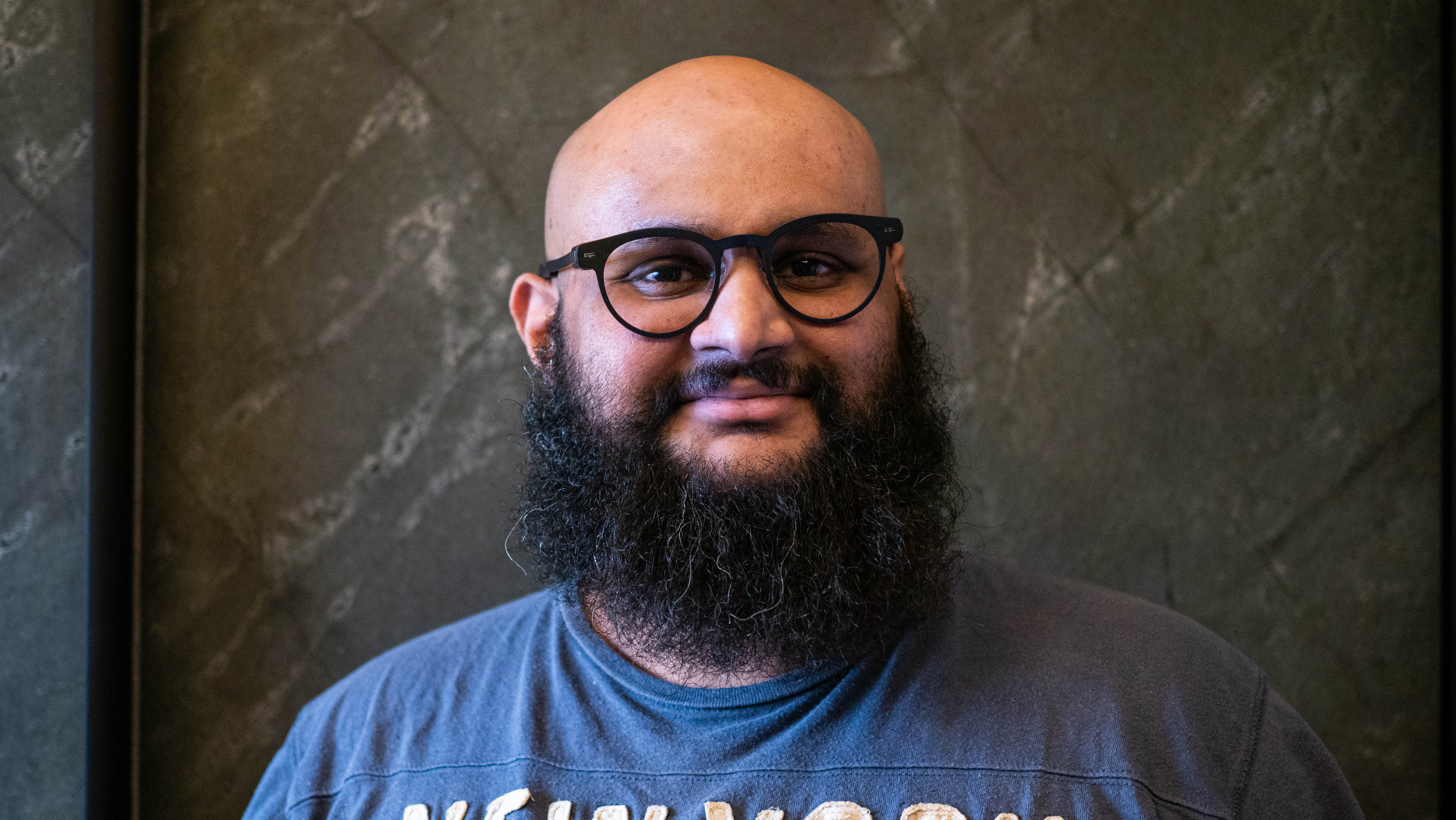 Harish wearing MemoMind One camera-free smart glasses