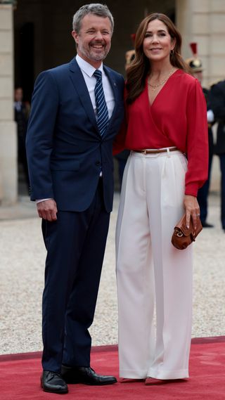 King Frederik X of Denmark and Queen Mary of Denmark attend a reception for foreign leaders prior to the Olympics Opening Ceremony