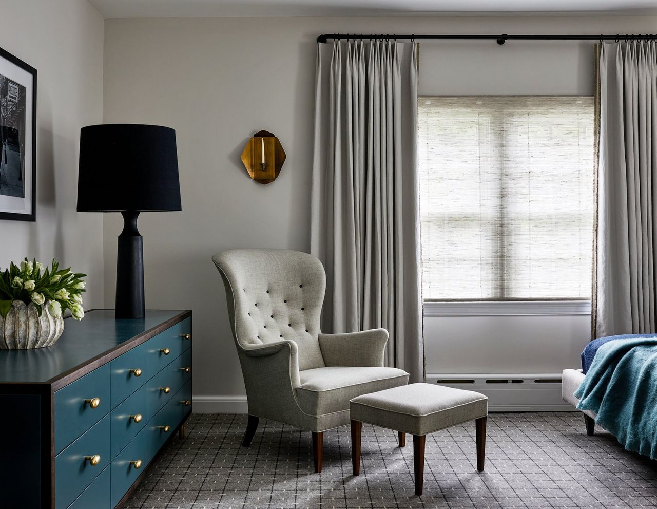 a bedroom with a patterned carpet