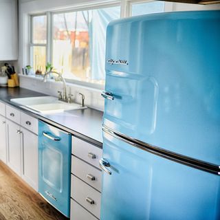 Kitchen with window and fridge