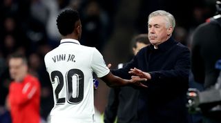 Carlo Ancelotti and Vinicius Junior during Real Madrid's LaLiga game against Valencia in February 2023.