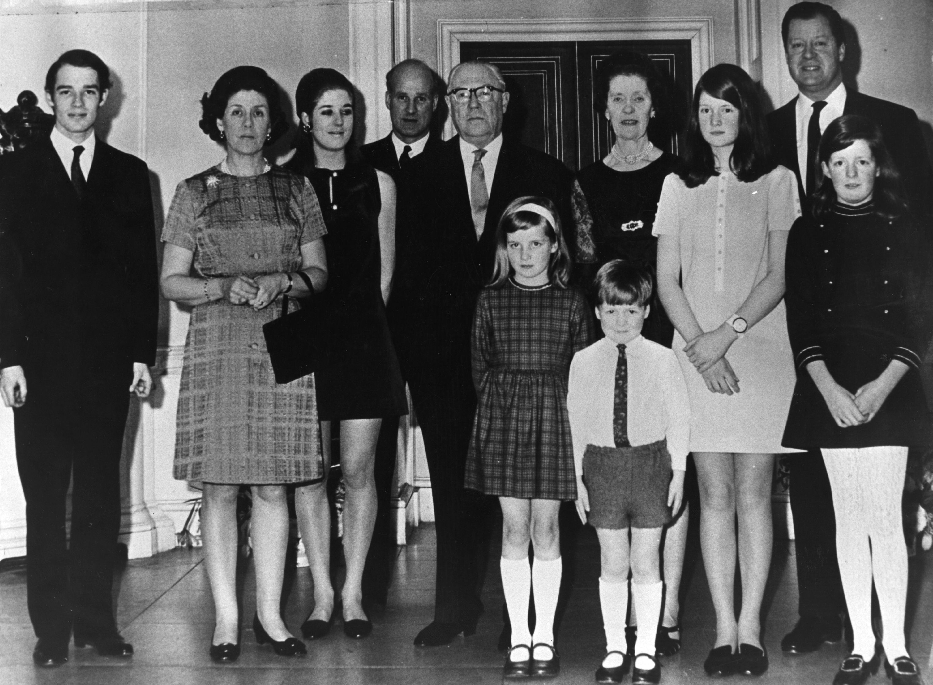Members of the Spencer family, including Princess Diana, pose at the golden wedding of the 7th Earl and Countess of Spencer in 1969.