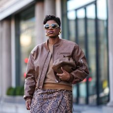 amazon prime day deals - woman in brown outfit - Getty Images 1978715115