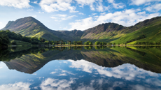 Reflections on Buttermere lake in the Lake District 