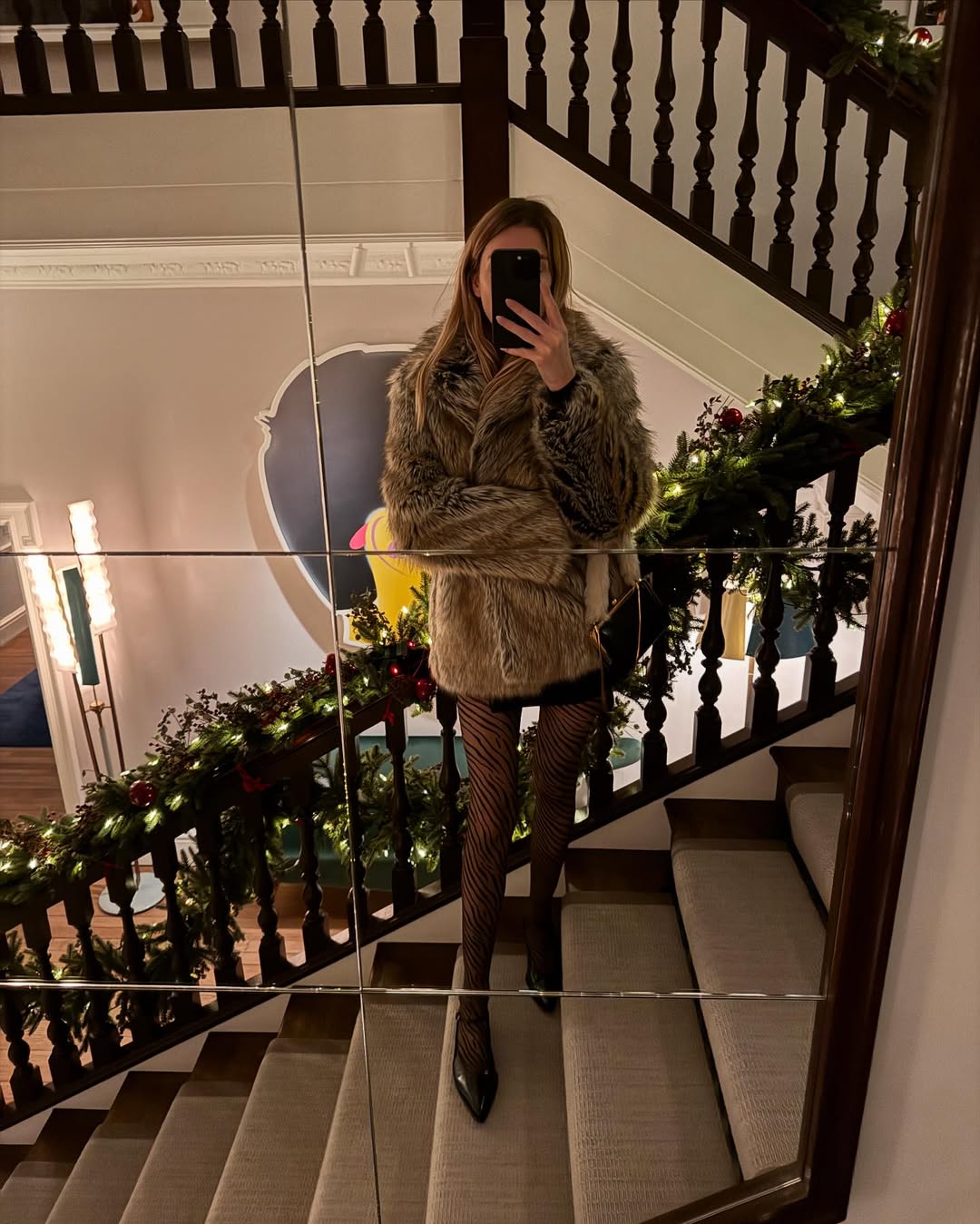 @camillecharriere wearing faux fur jacket