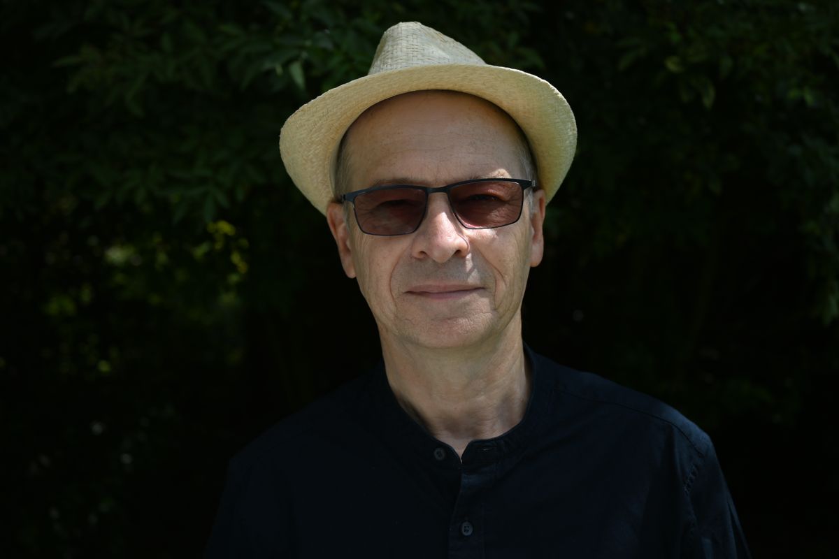 Profile shot of a man wearing a hat taken on the Nikon Z fc