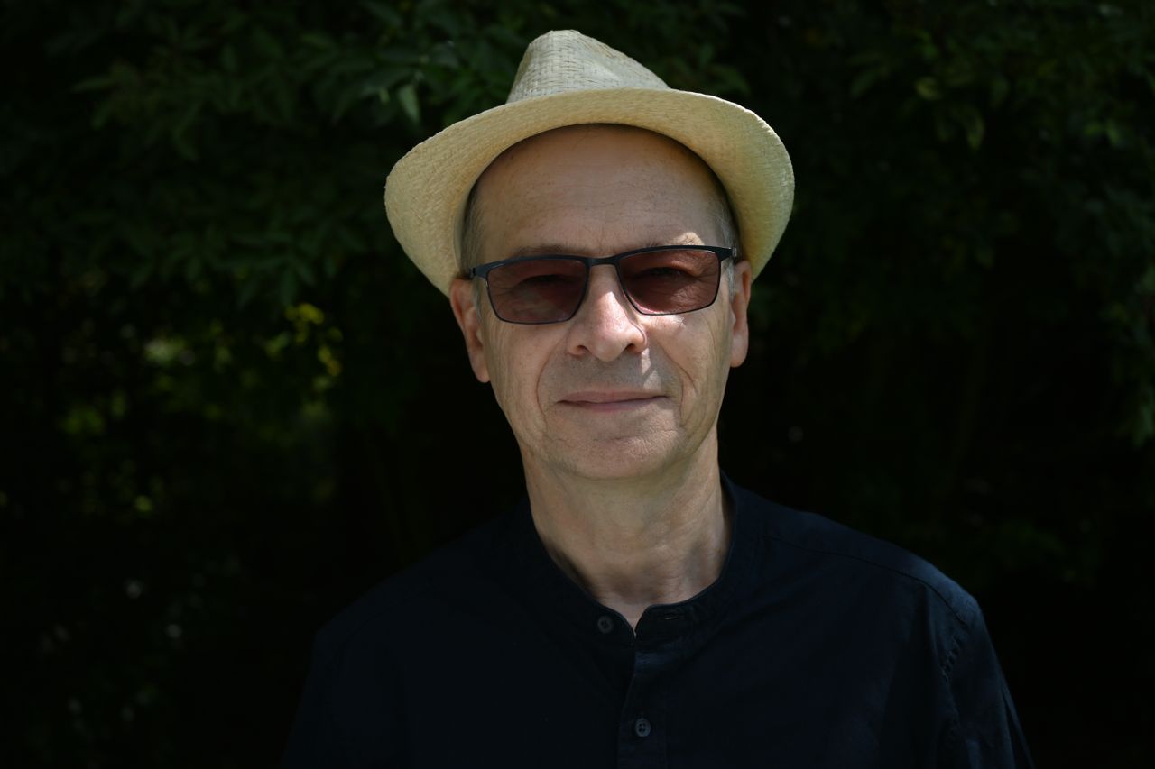 Profile shot of a man wearing a hat taken on the Nikon Z fc