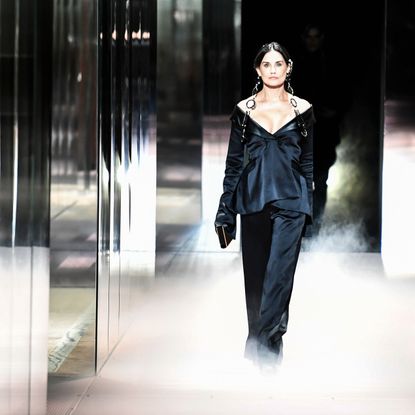 us actress demi moore presents a creation of british designer kim jones for the fendis spring summer 2021 collection during the paris haute couture fashion week, in paris, on january 27, 2021 british designer kim jones presents his first ever couture collection for fendi since he joinded italian fashion house fendi as its lead designer for womenswear in september 2020 photo by stephane de sakutin afp photo by stephane de sakutinafp via getty images