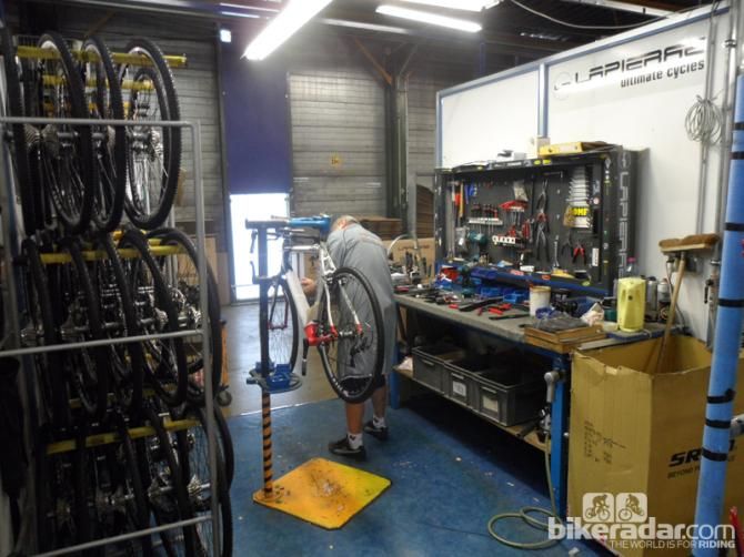 Lapierre's factory in Dijon, France, doesn't have a traditional assembly line. Each bike is assembled by one mechanic at a workstation like this