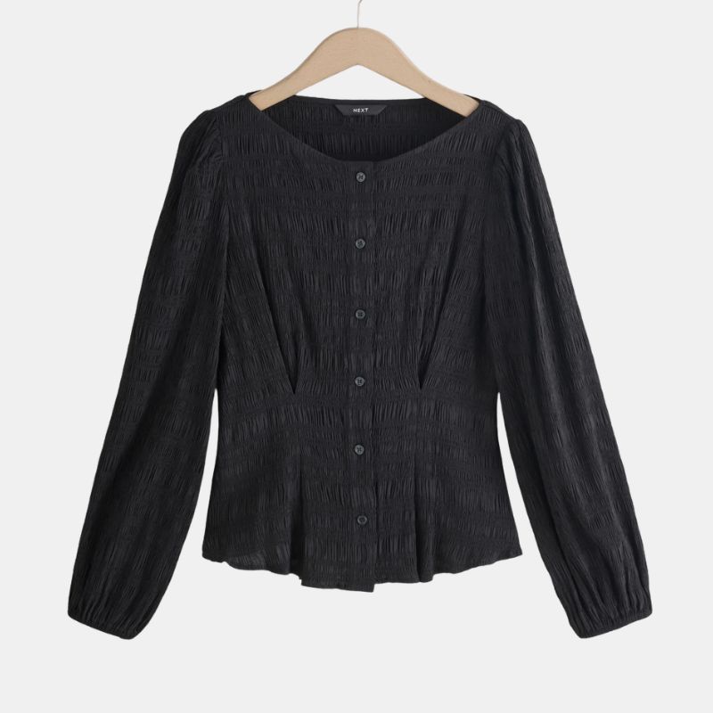 A cutout of a shirred blouse by Next