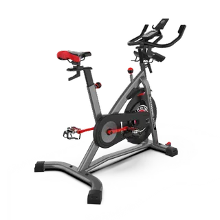 Schwinn 800IC exercise bike with its red detailing with the rear of the bike closest to the viewer. Allowing a good view of the and its cockpit area