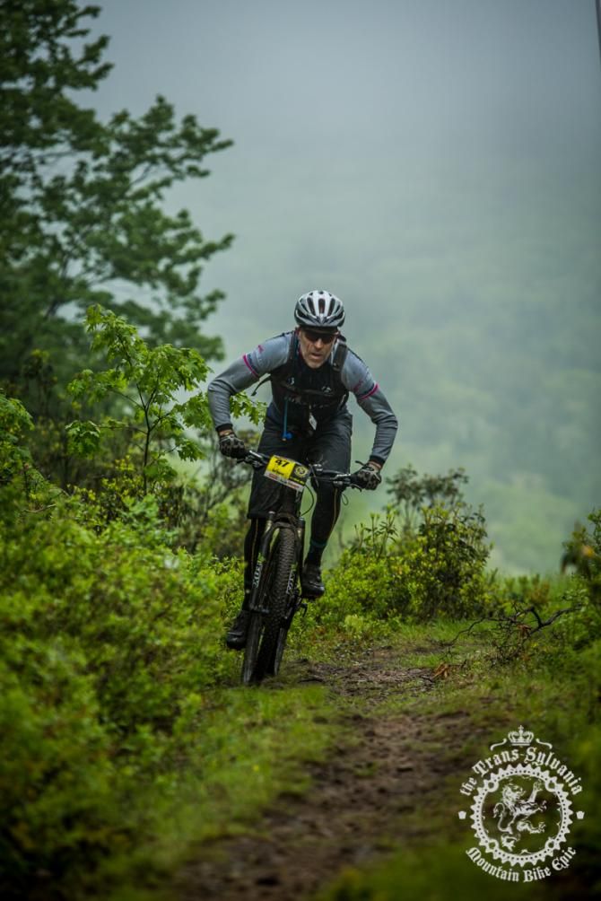 Rolf Rimrott crests the foggy hilltop and starts the enduro segment