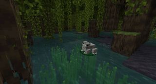 Minecraft - A frog in a mangrove swamp sits on a lillypad