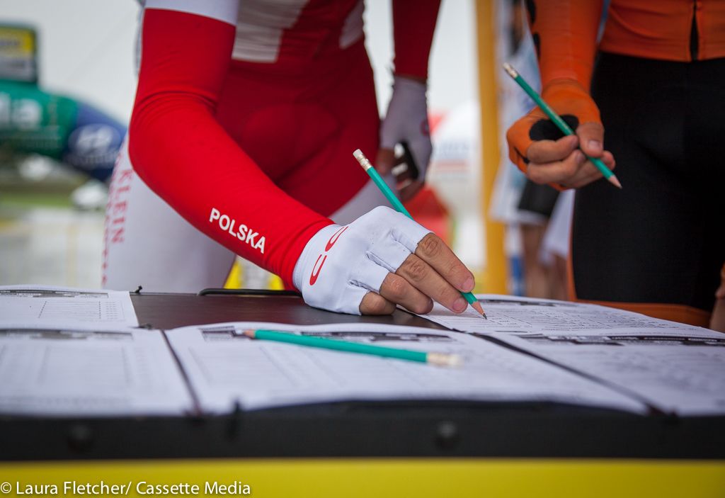 A rider from CCC Sprandi Polkowice signs on in his national tour