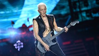 Phil Collen of Def Leppard performs onstage during the "Summer Stadium" tour at Truist Park on July 13, 2024 in Atlanta, Georgia