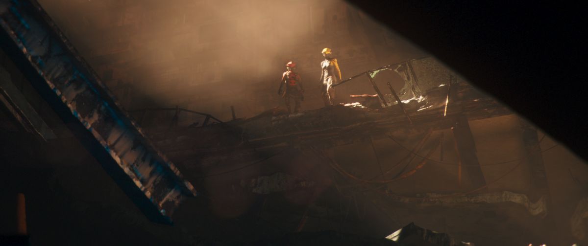 Babiru DaVinci Resolve colour tips; two cyberpunk characters stand in dust looking over a deep hole