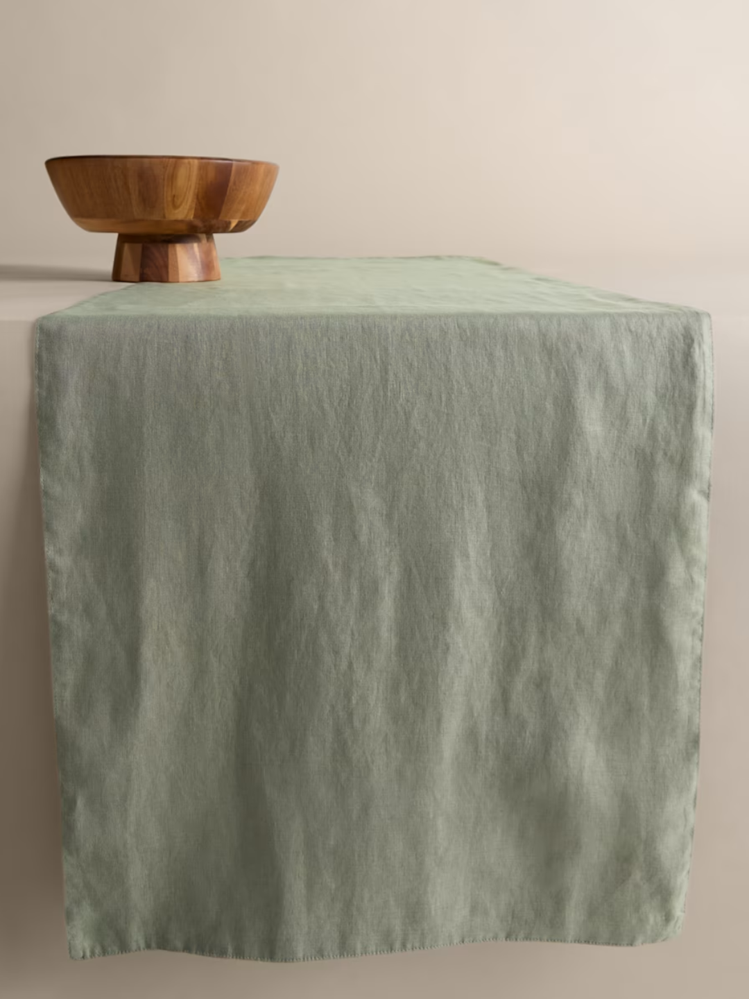 A green linen table runner from M&amp;amp;S
