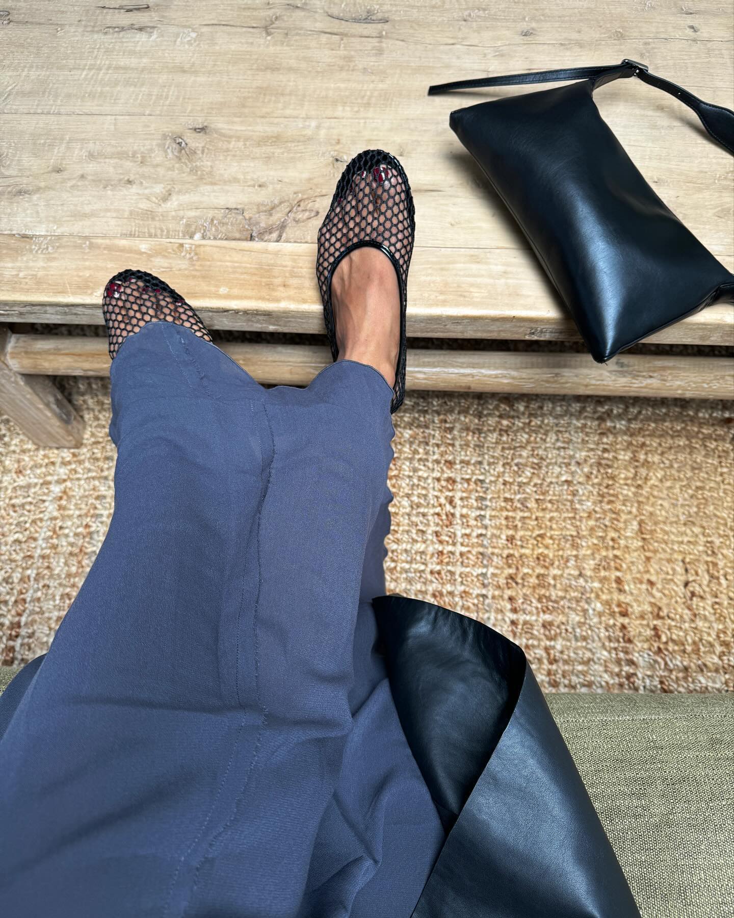 Monikh with red pedicure and mesh ballet flats