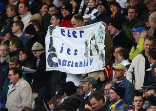 Leeds fans protest with banners against then chairman Peter Ridsdale