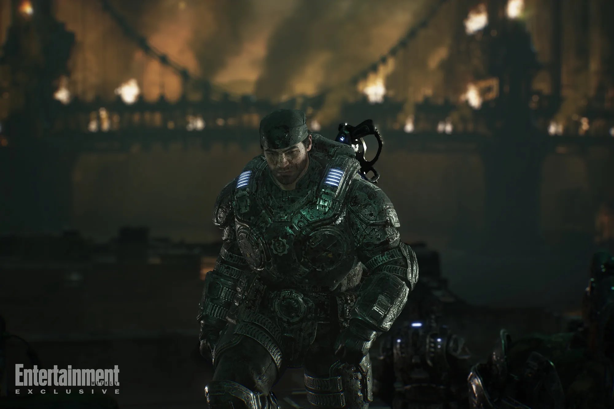 Marcus Fenix stands in battle-worn COG armor against a fiery, war-torn backdrop in Gears of War, highlighting the franchise's dark atmosphere and brutal conflict.