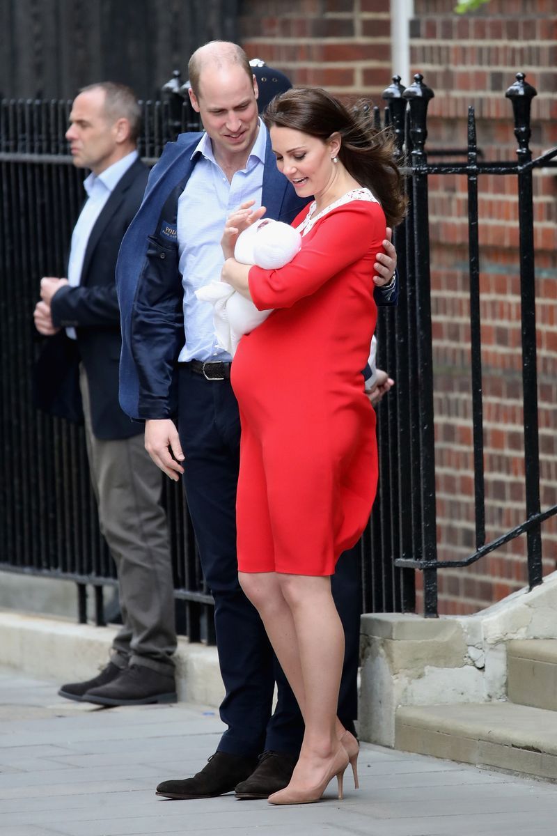 Red, Dress, Fashion, Leg, Event, Suit, Interaction, Formal wear, Footwear, Cocktail dress,